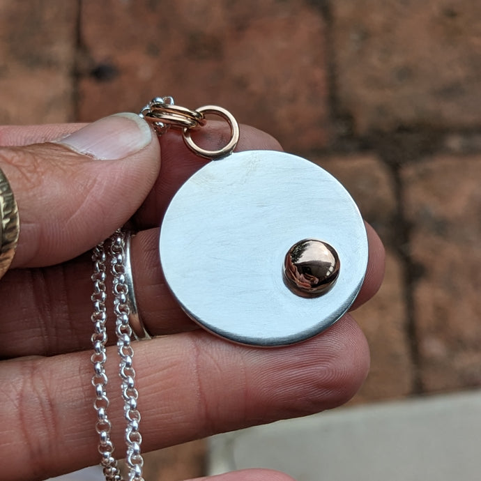 Sterling silver and 9ct rose gold blob pendant