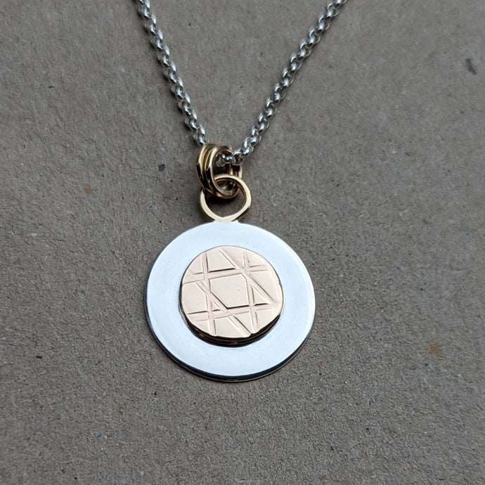 9ct yellow gold and sterling silver pendant