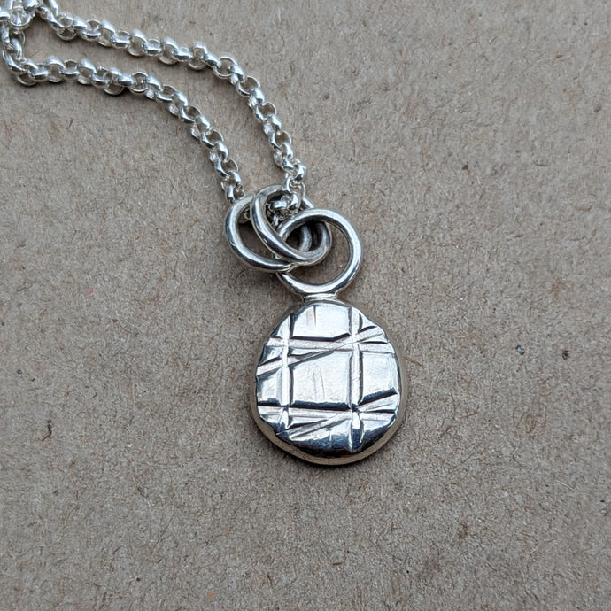 Sterling silver squashed blob pendant