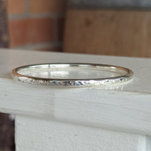 Load image into Gallery viewer, 4mm round hammered sterling silver bangle