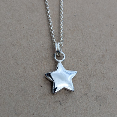 Sterling silver sand cast star pendant