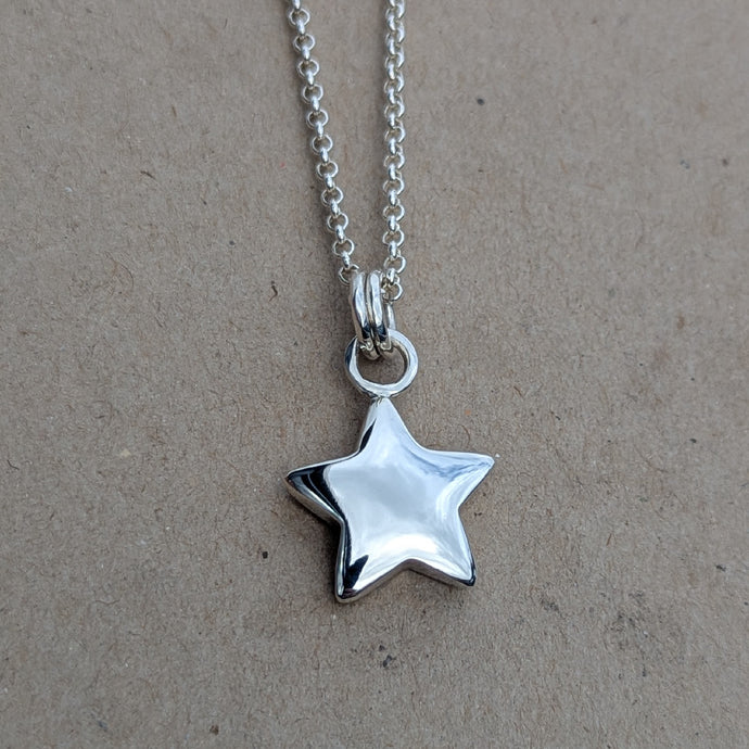 Sterling silver sand cast star pendant
