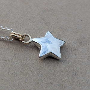 Sterling silver sand cast star pendant with 9ct solid yellow gold rings