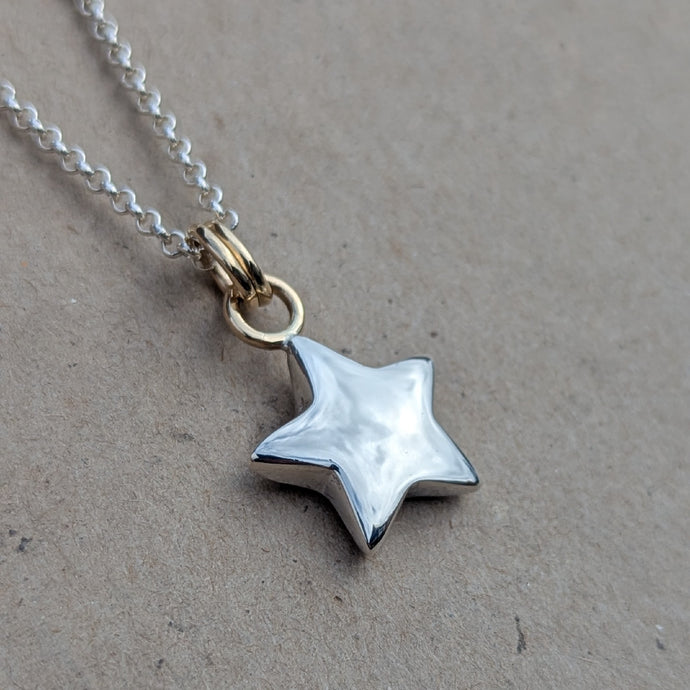 Sterling silver sand cast star pendant with 9ct solid yellow gold rings