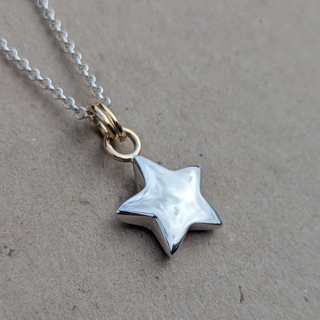 Sterling silver sand cast star pendant with 9ct solid yellow gold rings