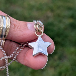 Sterling silver sand cast star pendant with 9ct solid yellow gold rings