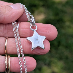 Sterling silver sand cast star pendant