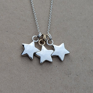 Sterling silver sand cast star pendant with 9ct solid yellow gold rings