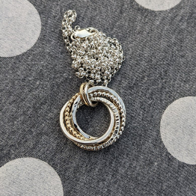 5 ring pendant with 9ct yellow gold beaded ring