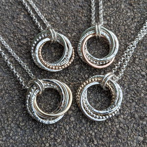 5 ring pendant with x2 9ct yellow gold rings
