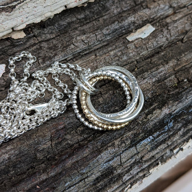 5 ring pendant with 9ct yellow gold beaded ring