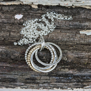 5 ring pendant with 9ct yellow gold beaded ring