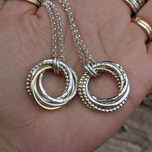 5 ring pendant with 9ct yellow gold ring
