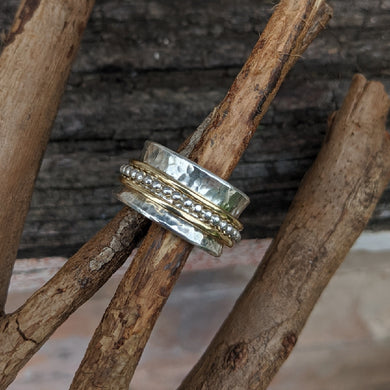 Sterling silver and yellow gold spinning ring size S1/2