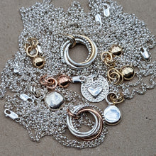 Load image into Gallery viewer, Sterling silver squashed blob pendant with x2 yellow gold rings