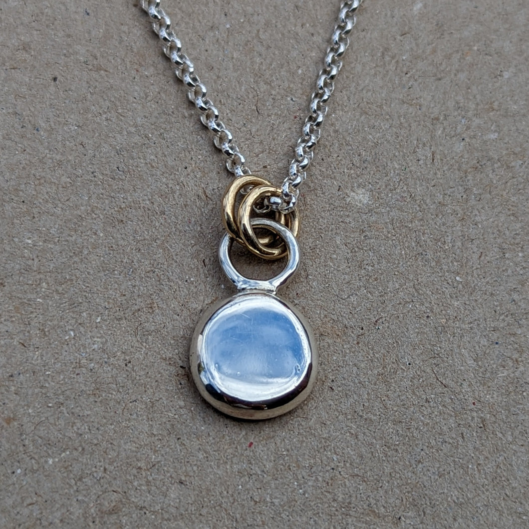 Sterling silver squashed blob pendant with x2 yellow gold rings