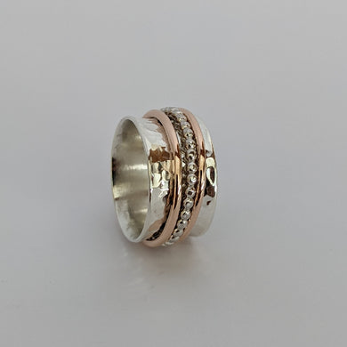 Sterling silver and rose gold spinning ring size O