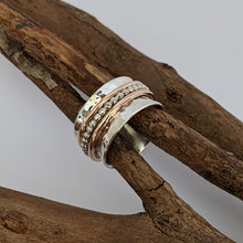 Load image into Gallery viewer, Sterling silver and rose gold spinning ring size O