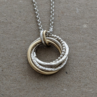 5 ring pendant with x2 9ct yellow gold rings