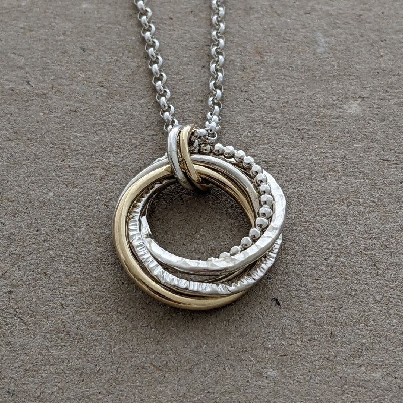 5 ring pendant with x2 9ct yellow gold rings