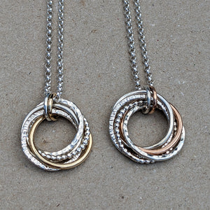 5 ring pendant with x2 9ct yellow gold rings