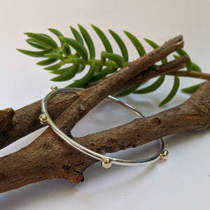 Yellow gold blob bangle