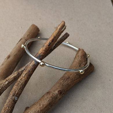 Yellow gold blob bangle