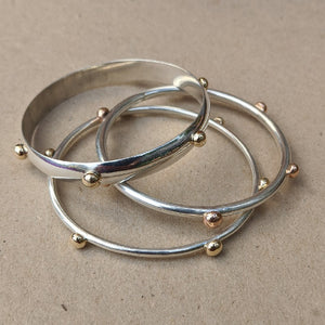 Yellow gold blob bangle